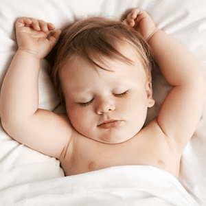 baby sleeping peacefully with white noise